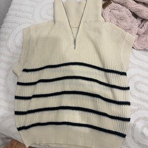 Black and white striped sleeveless sweater